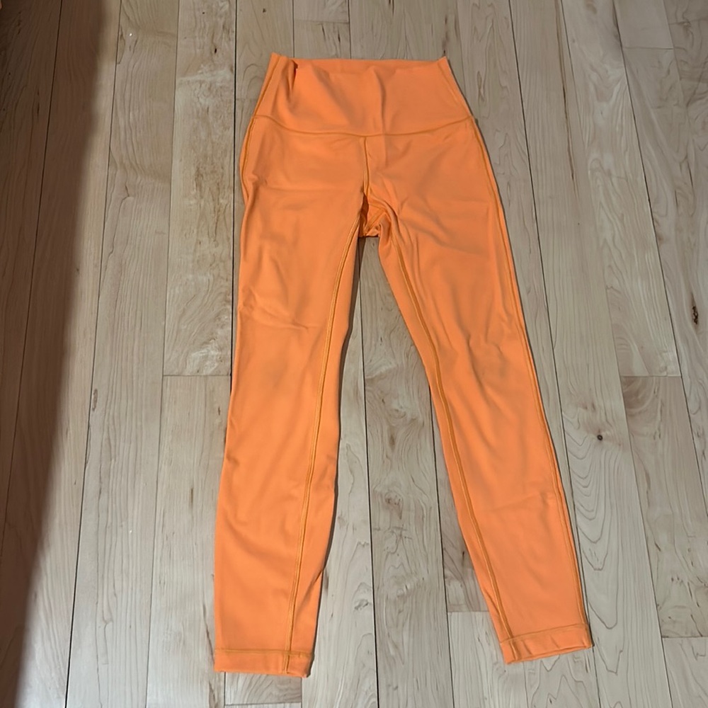 Orange soda Lululemon leggings, size 4